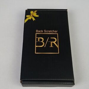 Telescoping Back Scratcher.